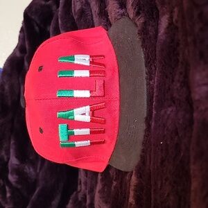 Italia red green and white size 7 1/8 hat